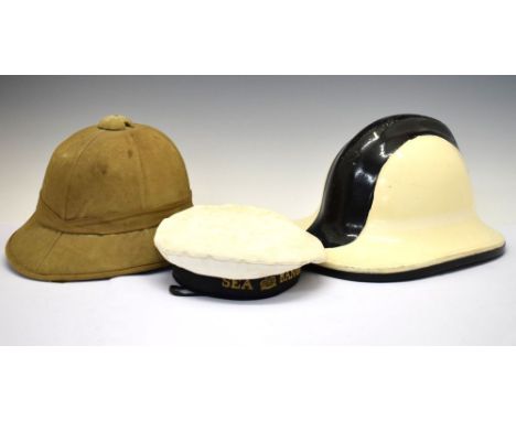 Vintage Sea Rangers sailor's hat, together with a pith helmet, etc Condition: Chips present to the paintwork of one, with gen