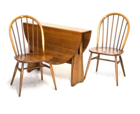 Ercol Golden Dawn Windsor gateleg table, 74cm high, together with a pair of chairs Condition: Light scratches and some small 