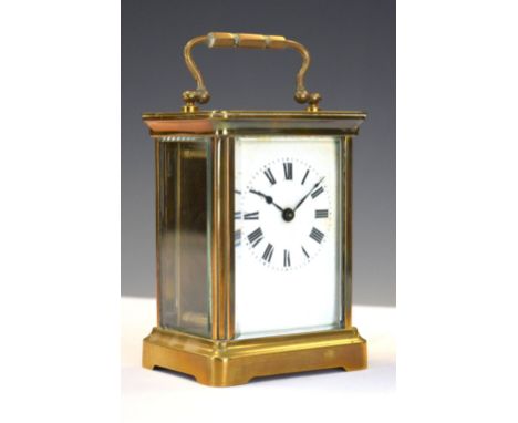 20th Century French brass cased carriage clock with white Roman dial, 11cm high excluding handle, with key Condition: Some si
