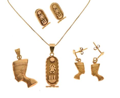 Two sets of Eastern yellow metal and unmarked jewellery comprising Egyptian-style bust pendant and matching ear studs, togeth