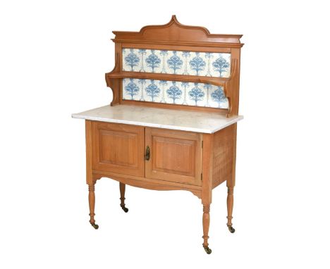 Satin birch or walnut marble top washstand, 130cm high x 90cm wide approx Condition: Watermarks to the front of the piece, an