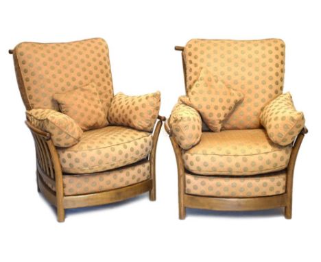 Pair of Ercol Golden Dawn armchairs, 98cm high Condition: Cushions would benefit from a clean, the woodwork having some light