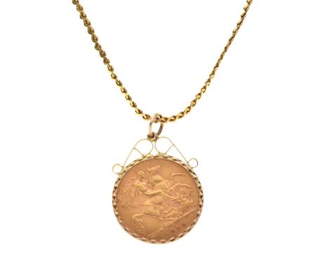 Edward VII half sovereign 1910, within textured 9ct gold frame, scroll mount and loop as pendant, suspended from a yellow met