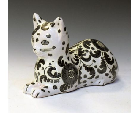 Tin glazed ceramic model of a cat, 33cm long Condition: Overall crazing. **Due to current lockdown conditions this is an onli