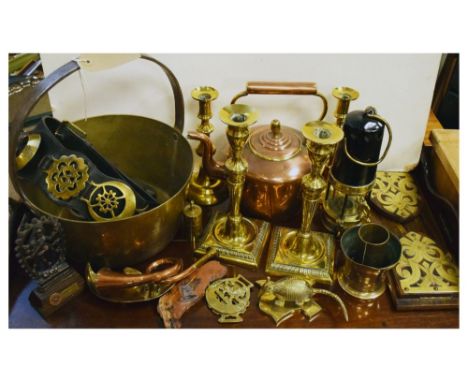 Quantity of brass and copper to include miners lamp, candlesticks, copper kettle etc Condition: Some pieces being tarnished a