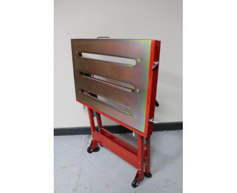A metal folding work bench 