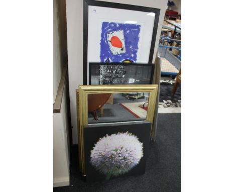 An abstract colour print together with two mirrors, a canvas picture and a print