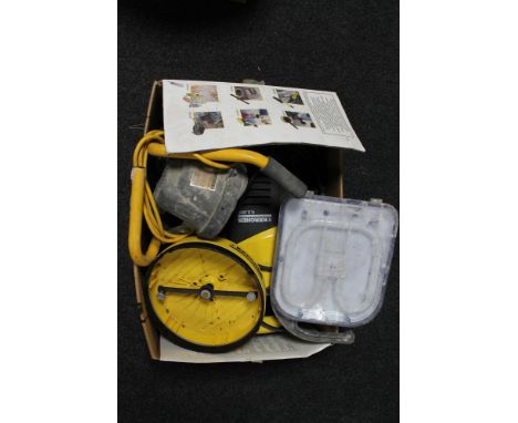 A box of site light and Karcher pressure washer 