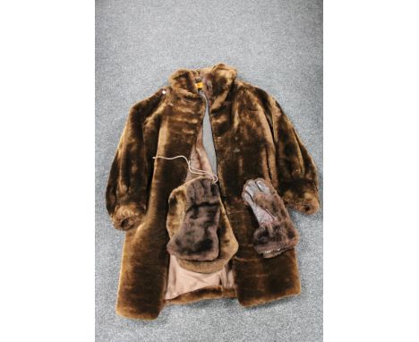 A vintage fur shawl together with faux fur coat, gloves and hat