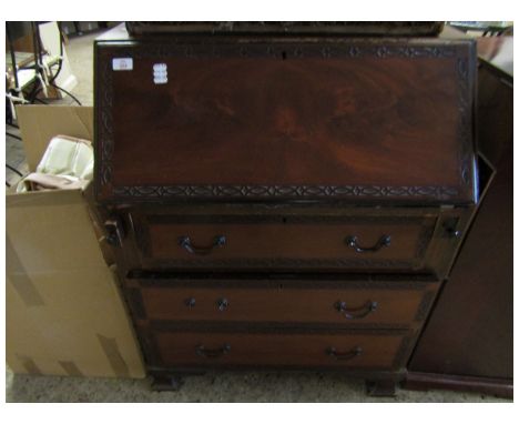 EARLY 20TH CENTURY MAHOGANY DROP FRONTED BUREAU WITH CARVED BORDER WITH THREE FULL WIDTH DRAWERS RAISED ON BRACKET FEET   