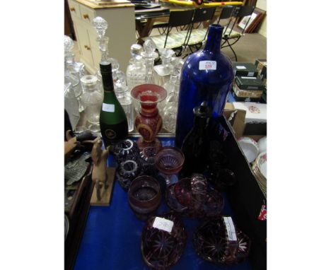 MIXED LOT CONTAINING A BARLEY TWIST CANDLESTICK, BLUE GLASS BOTTLES, CRANBERRY CUT GLASS BASKETS, VASES ETC   