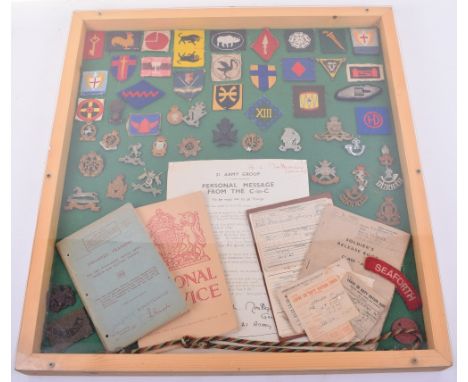 Framed Display of British Cloth Formation Signs, Cap Badges and Shoulder Titles etc, including printed 40th Infantry division