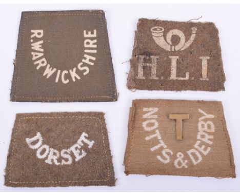 4x WW1 Slip-on Shoulder Titles, consisting of painted on khaki H.L.I below bugle (Highland Light Infantry), printed white on 