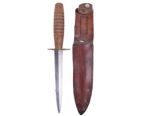 WW2 Wooden Hilted Far East Issue Fairbairn Sykes (F.S) Commando Knife, grooved wooden grip and large brass oval cross guard. 