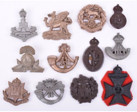 12x WW2 War Economy Plastic Cap Badges, consisting of Lancashire Fusiliers, Green Howards, Duke of Cornwall’s Light Infantry,