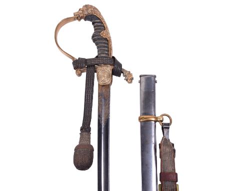 Imperial German Artillery Officers Sword with Gilt Panel and Artificial Damascus Blade, gilt lion head example with crossed c