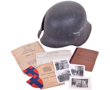 WW2 Luftwaffe Battle Damaged Steel Combat Helmet, M40 pattern steel combat helmet retaining much of its original Luftwaffe bl