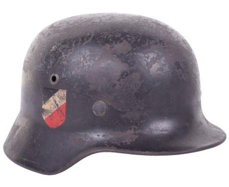 WW2 German Army Double Decal Steel Combat Helmet, fine example of the early M35 steel combat helmet which retains much of its