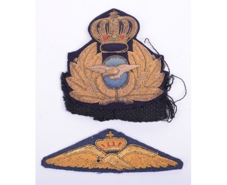 Greek Airforce Pilots Wing & Cap Badges, both being bullion embroidered examples. The cap badge remains on a section of mohai