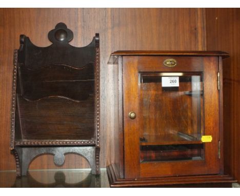 A VINTAGE MAHOGANY SMOKERS CABINET TOGETHER WITH AN OAK PIPE RACK  