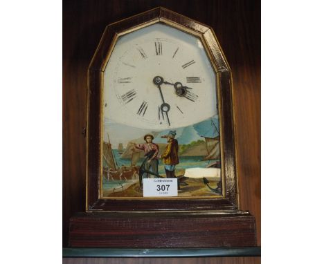 A VINTAGE FIGURATIVE MANTEL CLOCK