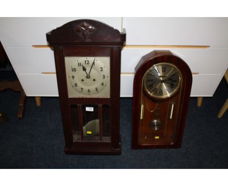 A VINTAGE OAK WALL CLOCK TOGETHER WITH A MODERN 'MAXIM' WALL CLOCK