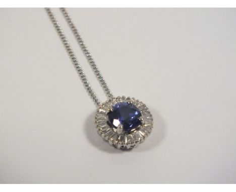 A PLATINUM SAPPHIRE AND DIAMOND PENDANT, set on a 925 silver chain, Dia. 11 mm 