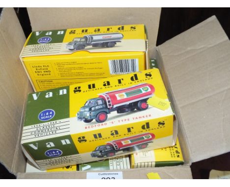 A COLLECTION OF BOXED VANGUARDS, SCALE TRUCK MODELS WITH DISPLAY RACK