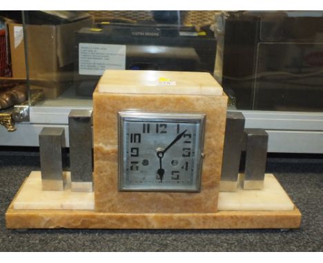 AN ART DECO MARBLE AND CHROME EFFECT MANTEL CLOCK 
