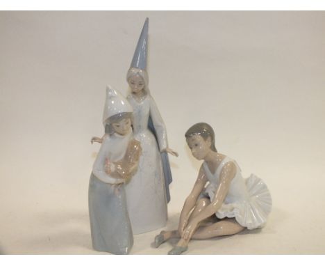 TWO LLADRO FIGURES, TOGETHER WITH A SEATED NAO BALLERINA FIGURE (3) 