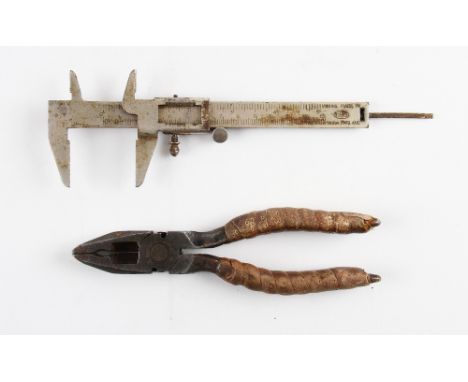 Tennis Racket Fabrication Tools to include a Vernier Caliper for handle measurements together with a pair of pliers. Note: Di