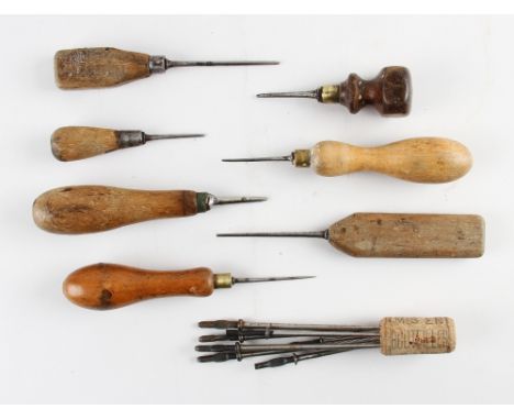 Various Tennis Racket Fabrication Tools includes a selection of tools with wooden handles and sharp ended implements, and oth