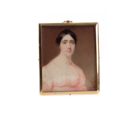 EARLY 20TH CENTURY ENGLISH SCHOOL,PORTRAIT MINIATURE OF A LADY,watercolour on ivory, signed 'W.E.N.', and dated 1915,framed a