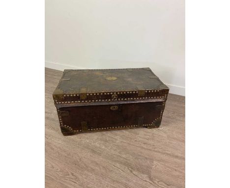 19TH CENTURY LEATHER BOUND COACHING TRUNK,studded and brass bound, with plaque initialled 'WW' or 'MM', 66cm wideCondition re