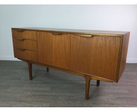 A. H. MCINTOSH OF KIRKCALDY TEAK SIDEBOARD,with three drawers to left side, the upper fitted for cutlery and housing maker's 