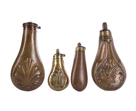 FOUR 19TH CENTURY COPPER POWDER FLASKS,three variously relief decorated with scrolls and shells, brass mounted, the largest 1