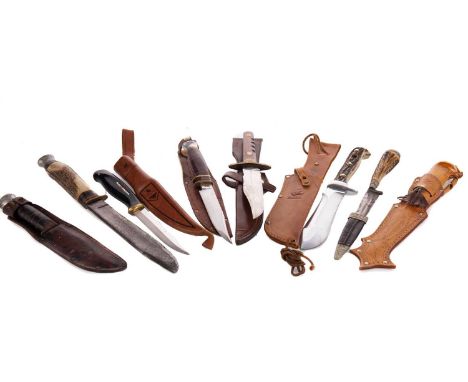 EIGHT HUNTING KNIVES,including Finnish Normark, German Puma and English Premier Lifetime examples, variously sized, seven wit