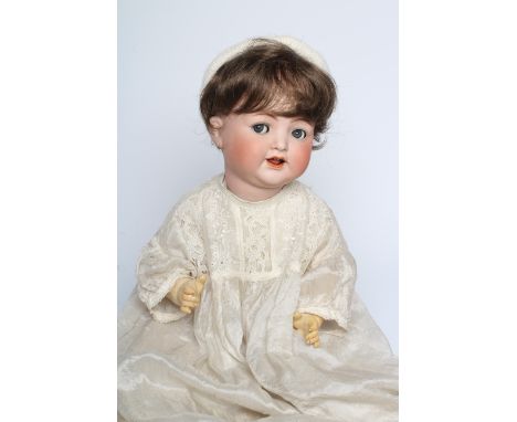 A Kammer & Reinhardt socket head flirty character doll, with blue glass flirting eyes, metal sleeping eyelids, open mouth, tw