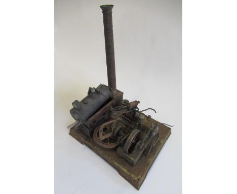 A stationary steam engine with dynamo single cylinder spirit fired engine driving dynamo to light, possibly by Doll Germany, 