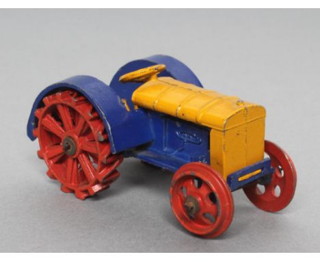 Dinky 22e farm tractor in yellow/blue and red, minor chips to paintwork, G (Est. plus 21% premium inc. VAT)