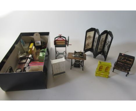 A quantity of doll's house furniture and accessories, including a Dinky bedroom suite, a chinoiserie bureau, metal mangle, me