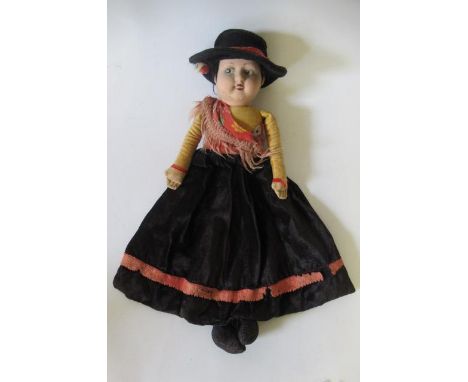 A Norah Wellings cowgirl, with felt face, long skirt, sash and hat, 19" long (Est. plus 21% premium inc. VAT)Generally good, 