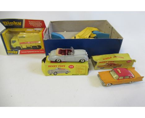 Dinky 964 Elevator Loader, 265 Plymouth Taxi, 194 Bentley Coupe and 383 Carrier Truck, boxes AF, models G-F (Est. plus 21% pr