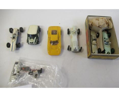 Seven slot racing cars by Airfix and others including Mini Cooper, and F1 cars, one item needs repair, F-G (Est. plus 21% pre