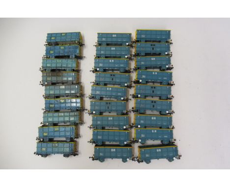 Twenty seven steel open wagons in blue/yellow comprising eighteen by Bachmann and nine kit built models, some weathering on k