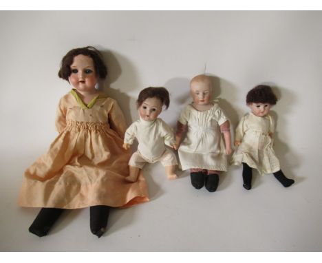 Four bisque head dolls, comprising a 9" Heubach 5/0 solemn boy, a 14" Armand Marseille 370 7/0 shoulder head with sleeping ey