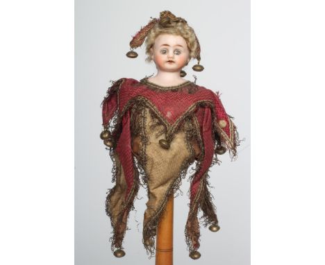 A bisque shoulder head musical marotte doll, by Heinrich Handwerck, with blue glass fixed eyes, open mouth and teeth, turned 