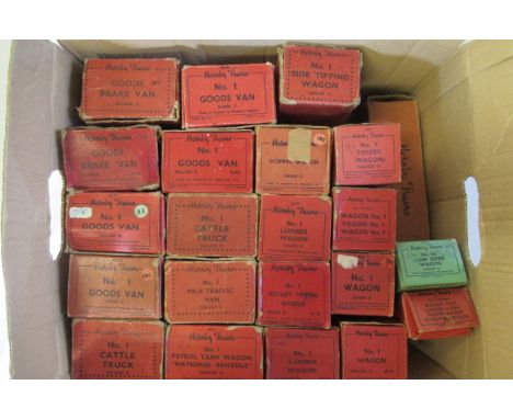 Twenty two Hornby trains goods wagons including goods van, cattle truck, tank wagon and hopper wagon, all items boxed, boxes 