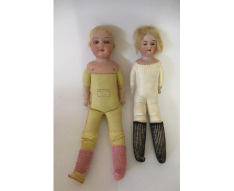 Two Armand Marseille bisque shoulder head dolls, comprising a 13" 7 10 with brown glass sleeping eyes, open mouth and kid bod