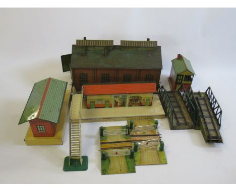 Hornby trackside accessories including electric two road engine shed, No 2 station, signal box and goods shed, some items dam
